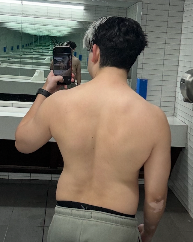 Back-view personal progress photo taken earlier in the journey