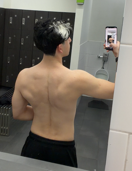 Back-view personal progress photo taken later in the journey
